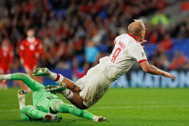 RECORD DATE NOT STATED 4th October 2026; Cardiff City Stadium, Cardiff, Wales; UEFA Nations League Football, Wales versus Denmark; Gustav Isaksen of Denmark is fouled by Danny Ward of Wales to draw penalty kick AmandaxMcMaster