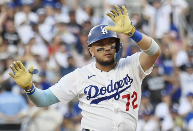 Los Angeles Dodgers Miguel Rojas (72) celebrates on second base after hitting a double against the Atlanta Braves in the third inning in an MLB, Baseball Herren, USA National League Division Series game at Dodger Stadium in Los Angeles, California, on Sunday, October 4, 2026. LAP20261004707 JIMxRUYMEN