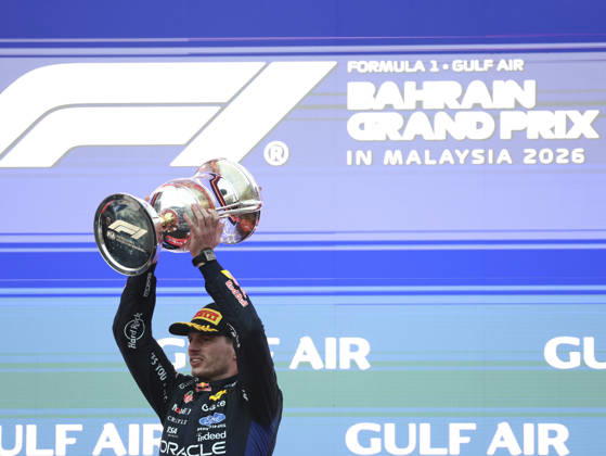 KUALA LUMPUR, MALAYSIA - OCTOBER 04: Max Verstappen of the Netherlands and Oracle Red Bull Racing celebrates on the podium with trophy after winning after the race of the FIA Formula 1 Grand Prix of Bahrain in Malaysia at the Sepang Circuit on October 04, 2026 in Kuala Lumpur, Malaysia. (Photo by Qian Jun SPP-Paddocker) Copyright: xQianxJun SPP-Paddockerx Sportspressphoto_SPR246575