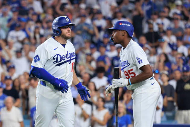 October 4, 2026, Los Angeles, California, USA: Max Muncy 13 of the Los Angeles Dodgers is congratulated by Josue De Paula 95 after hitting a solo home urn in the 9th inning during NLDS Game 2 against the Atlanta Braves on Sunday October 4, 2026 at Dodger Stadium in Los Angeles, California. Dodgers lose to Braves, 2-3. JAVIER ROJAS PI Dodgers Vs. Braves NLDS - Game 2 - ZUMAp124 20261004_zaa_p124_030 Copyright: xJavierxRojasx