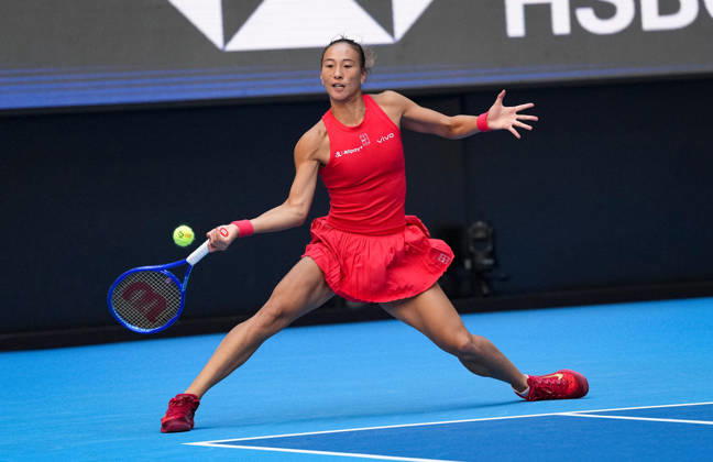 (261005) -- BEIJING, Oct. 5, 2026 -- Zheng Qinwen of China hits a return during the women s singles round of 32 match against Marie Bouzkova of the Czech Republic at 2026 China Open tennis tournament in Beijing, China, Oct. 5, 2026. ) (SP)CHINA-BEIJING-TENNIS-CHINA OPEN-WOMEN S SINGLES(CN) SunxFei