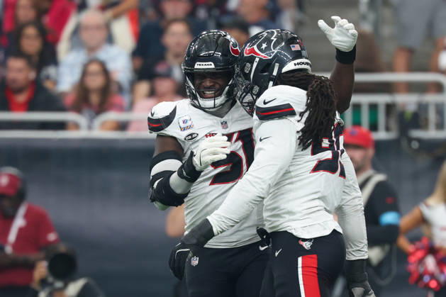 HOUSTON, TX - OCTOBER 04: Defensive end Will Anderson Jr. 51 of the Houston Texans and defensive end Jadeveon Clowney 90 of the Houston Texans celebrate a defensive stop during the NFL, American Football Herren, USA football game between the Houston Texans and Dallas Cowboys on October 4, 2026, at Reliant Stadium in Houston, TX. (Photo by David Buono Icon Sportswire) NFL: OCT 04 Cowboys at Texans EDITORIAL USE ONLY Icon241004163