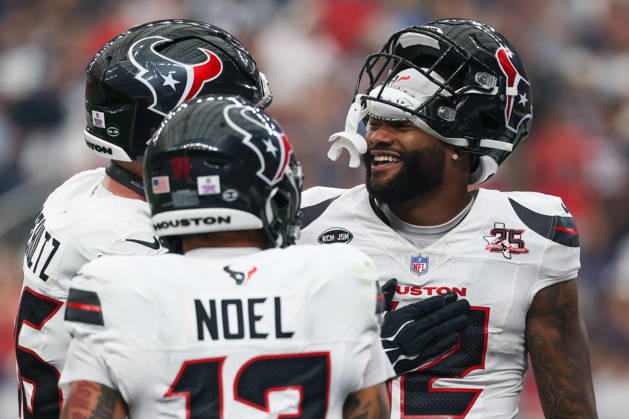 HOUSTON, TX - OCTOBER 04: Wide receiver Nico Collins 12 of the Houston Texans smiles and celebrates with teammates after scoring a touchdown during the NFL, American Football Herren, USA football game between the Houston Texans and Dallas Cowboys on October 4, 2026, at Reliant Stadium in Houston, TX. (Photo by David Buono Icon Sportswire) NFL: OCT 04 Cowboys at Texans EDITORIAL USE ONLY Icon241004191