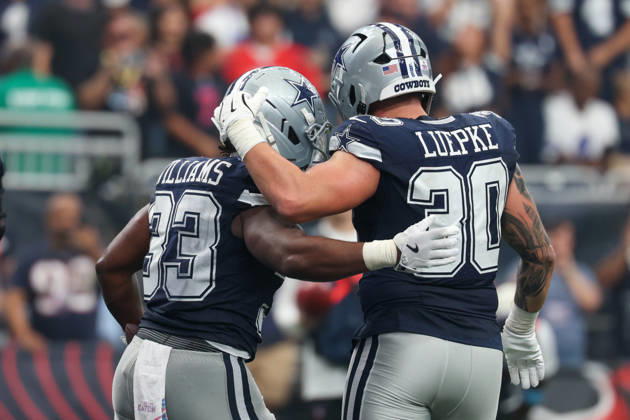 HOUSTON, TX - OCTOBER 04: Running back Javonte Williams 33 of the Dallas Cowboys and running back Hunter Luepke 30 of the Dallas Cowboys celebrate a touchdown run during the NFL, American Football Herren, USA football game between the Houston Texans and Dallas Cowboys on October 4, 2026, at Reliant Stadium in Houston, TX. (Photo by David Buono Icon Sportswire) NFL: OCT 04 Cowboys at Texans EDITORIAL USE ONLY Icon241004206