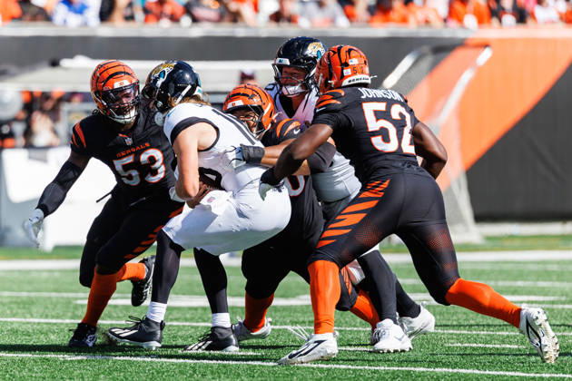 Oct 4, 2026; Cincinnati, OH, USA; Jacksonville Jaguars quarterback Trevor Lawrence (16) is sacked by Cincinnati Bengals defenders during NFL, American Football Herren, USA game action at Paycor Stadium. Mandatory Credit: -Cal Media - ZUMAc04_ 20261004_zma_c04_593 Copyright: xJohnxMersitsx