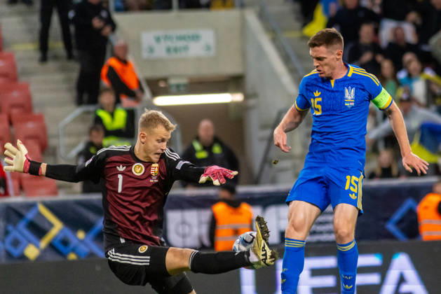 Balazs Toth of Hungary and Blackburn Rovers and Viktor Tsygankov of Ukraine and Ajax Amsterdam during UEFA Nations League League phase game between Ukraine vs Hungary (Dominika Kortvelyesiova Ball Raw Images) Trnava Antona Malatinskeho Stadium Slovakia Copyright: xDominikaxKortvelyesiovax DKOR6145