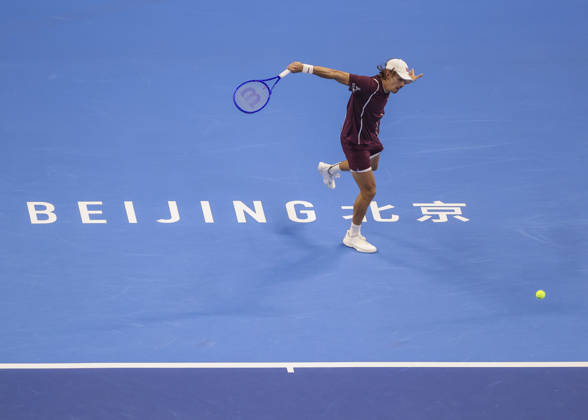 (261006) -- BEIJING, Oct. 6, 2026 -- Alex de Minaur of Australia hits a return during the men s singles final match against Novak Djokovic of Serbia at 2026 China Open tennis tournament in Beijing, China, Oct. 6, 2026. (Photo by Xinhua) (SP)CHINA-BEIJING-TENNIS-CHINA OPEN-MEN S SINGLES-FINAL(CN) MaxZihan