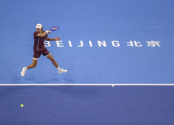 (261006) -- BEIJING, Oct. 6, 2026 -- Alex de Minaur of Australia hits a return during the men s singles final match against Novak Djokovic of Serbia at 2026 China Open tennis tournament in Beijing, China, Oct. 6, 2026. (Photo by Xinhua) (SP)CHINA-BEIJING-TENNIS-CHINA OPEN-MEN S SINGLES-FINAL(CN) MaxZihan