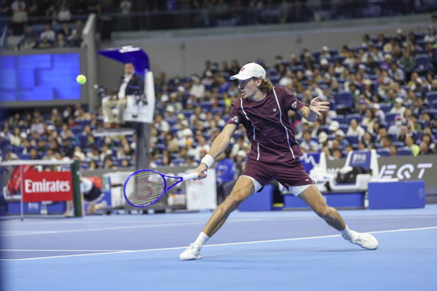 (261006) -- BEIJING, Oct. 6, 2026 -- Alex de Minaur of Australia hits a return during the men s singles final match against Novak Djokovic of Serbia at 2026 China Open tennis tournament in Beijing, China, Oct. 6, 2026. ) (SP)CHINA-BEIJING-TENNIS-CHINA OPEN-MEN S SINGLES-FINAL(CN) BaixXuefei