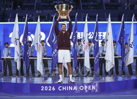 (261006) -- BEIJING, Oct. 6, 2026 -- Novak Djokovic of Serbia holds up the champion trophy during the awarding ceremony for the men s singles final at 2026 China Open tennis tournament in Beijing, China, Oct. 6, 2026. ) (SP)CHINA-BEIJING-TENNIS-CHINA OPEN-MEN S SINGLES-AWARDING CEREMONY(CN) BaixXuefei