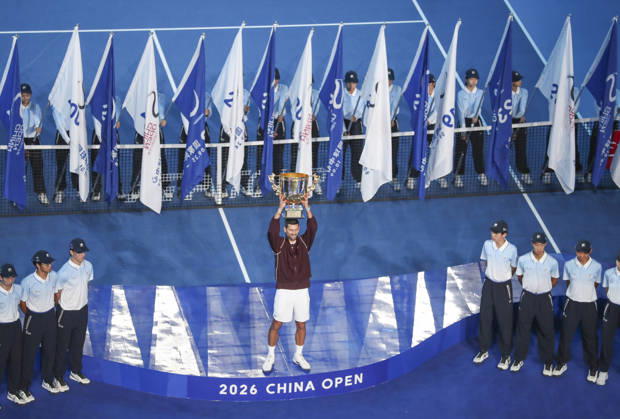 (261006) -- BEIJING, Oct. 6, 2026 -- Novak Djokovic of Serbia holds up the champion trophy during the awarding ceremony for the men s singles final at 2026 China Open tennis tournament in Beijing, China, Oct. 6, 2026. (Photo by Xinhua) (SP)CHINA-BEIJING-TENNIS-CHINA OPEN-MEN S SINGLES-AWARDING CEREMONY(CN) MaxZihan