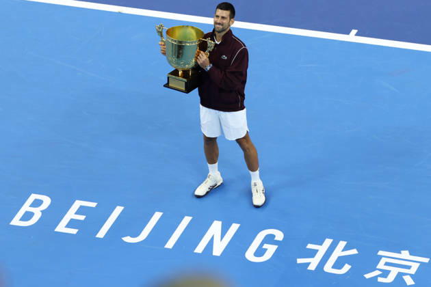 (261006) -- BEIJING, Oct. 6, 2026 -- Winner Novak Djokovic of Serbia holds the champion trophy during the awarding ceremony for the men s singles final at 2026 China Open tennis tournament in Beijing, China, Oct. 6, 2026. ) (SP)CHINA-BEIJING-TENNIS-CHINA OPEN-MEN S SINGLES-AWARDING CEREMONY(CN) ZhangxChenlin