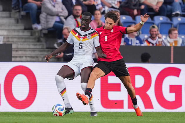 October 6, 2026, xydrx, Men s, Soccer, International Match, U21, European Championship Qualifiers, Germany vs. Georgia, 2026–2027 Season, Schüco Arena: Joshua Quarshie (GER), No. 5, in a tackle against Diego Deisadze (GEO), No. 9. DFB regulations prohibit any use of photographs as image sequences and or quasi-video Copyright: HMBxMedia YannisxDreimann