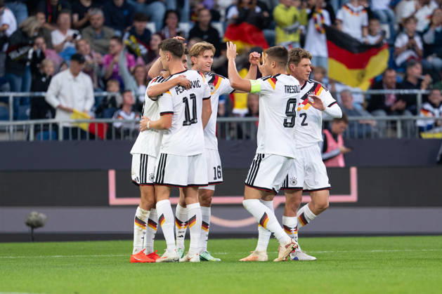 October 6, 2026, GER, Germany U21 vs. Georgia U21 Goal Celebration Cheers after the 1–0 goal by Noah Darvich, Germany U21; 17 Dzenan Pejcinovic, Germany U21; 11 Elias Baum, Germany U21; 2 Aljoscha Kemlein, Germany U21, 16 Nicolo Tresoldi, Germany U21, 9 Bielefeld SchücoArena, Bielefeld, Germany Copyright: xnordphotoxGmbHx xChristianxSchulzex