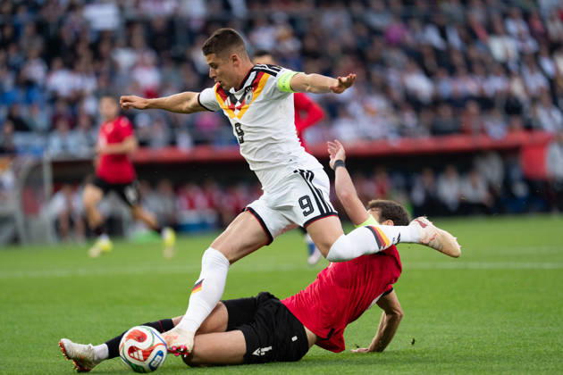 October 6, 2026, GER, Germany U21 vs. Georgia U21: A duel between Nicolo Tresoldi (Germany U21, No. 9) and Aleksandre Narimanidze (Georgia U21, No. 4), greatsche, Bielefeld SchücoArena, Bielefeld, Germany Copyright: xnordphotoxGmbHx xChristianxSchulzex