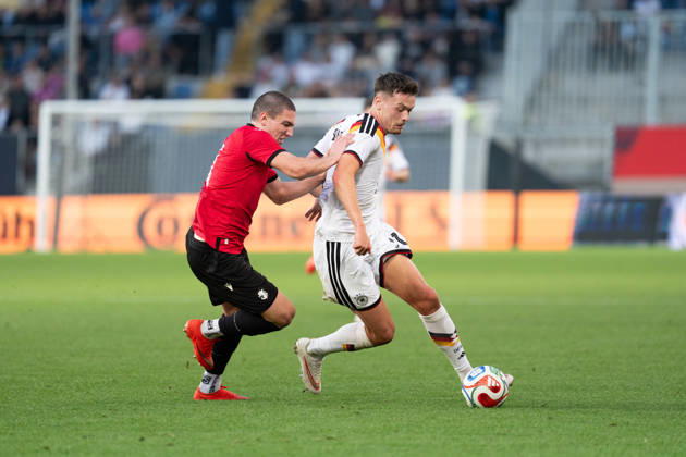 October 6, 2026, GER, Germany U21 vs. Georgia U21: A duel between Dzenan Pejcinovic (Germany U21, No. 11) and Aleksandre Amisulashvili (Georgia U21, No. 5) at the SchücoArena in Bielefeld, Germany Copyright: xnordphotoxGmbHx xChristianxSchulzex