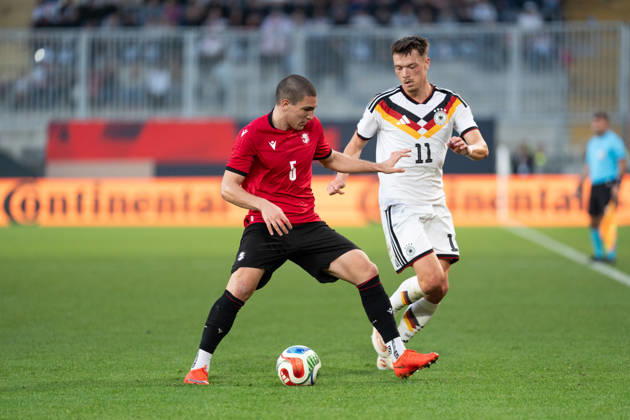 October 6, 2026, GER, Germany U21 vs. Georgia U21: A duel between Dzenan Pejcinovic (Germany U21, No. 11) and Aleksandre Amisulashvili (Georgia U21, No. 5) at the SchücoArena in Bielefeld, Germany Copyright: xnordphotoxGmbHx xChristianxSchulzex