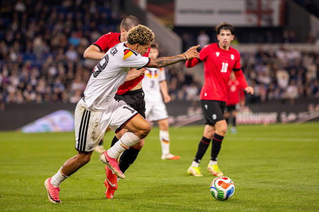 L R Paris Brunner, Germany U21, 19, in a tackle with Aleksandre Amisulashvili, Georgia U21, 05, in the background: GER, Germany vs. Georgia, GEO, Soccer, UEFA U21 European Championship Qualifiers, Group F, Matchday 13, 2026–2027 season, October 6, 2026 GER, Germany GER vs. Georgia GEO, soccer, UEFA U21 European Championship Qualifiers, Group F, Matchday 13, 2026–2027 season, October 6, 2026 Bielefeld Copyright: xEibner-Pressefoto JanxRollingerx EP_JSK