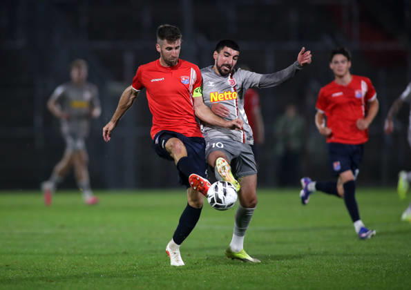 Soccer, Men s, Toto Cup, Quarterfinals, 2026–2027 Season, SpVgg Unterhaching vs. SSV Jahn Regensburg, Sportpark Unterhaching: Alexander Winkler (SpVgg Unterhaching, left) and Nassim Boujellab (SSV Jahn Regensburg, right) battle for the ball