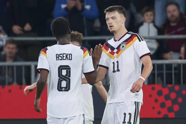 Dzenan Pejcinovic of Germany celebrates after scoring his team s second goal alongside Noel Aseko of Germany during the UEFA Under-21 EURO qualifier between Germany U-21 and Georgia U-21 at Almstadion on October 6, 2026, in Bielefeld, Germany. Photo by Marco Steinbrenner, DeFodi Images