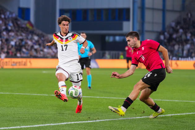 October 6, 2026, xydrx, Men s, Soccer, International Match, U21, European Championship Qualifiers, Germany vs. Georgia, 2026–2027 Season, Schüco Arena: Noah Darvich (GER), 17, in a tackle against Aleko Basiladze (GEO), 14. DFB regulations prohibit any use of photographs as image sequences and or quasi-video. Copyright: HMBxMedia YannisxDreimann
