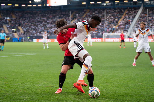 October 6, 2026, GER, Germany U21 vs. Georgia U21: A duel between Noel Aseko (Germany U21, No. 8) and Dato Bukia (Georgia U21, No. 3) at the SchücoArena in Bielefeld, Germany Copyright: xnordphotoxGmbHx xChristianxSchulzex