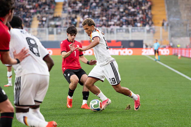 October 6, 2026, GER, Germany U21 vs. Georgia U21: A duel between Paris Brunner (Germany U21, 19) and Vakhtang Salia (Georgia U21, 7) at the SchücoArena in Bielefeld, Germany Copyright: xnordphotoxGmbHx xChristianxSchulzex