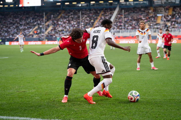 October 6, 2026, GER, Germany U21 vs. Georgia U21: A duel between Noel Aseko (Germany U21, No. 8) and Dato Bukia (Georgia U21, No. 3) at the SchücoArena in Bielefeld, Germany Copyright: xnordphotoxGmbHx xChristianxSchulzex