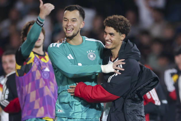 Goalkeepers Mio Backhaus (Germany) and Noah Darvich (Germany) cheer during the UEFA Under-21 EURO qualifier between Germany U21 and Georgia U21 at Almstadion on October 6, 2026, in Bielefeld, Germany. Photo by Marco Steinbrenner, DeFodi Images