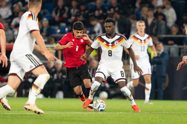 October 6, 2026, GER, Germany U21 vs. Georgia U21: A duel between Noel Aseko (Germany U21, No. 8) and Giorgi Robakidze (Georgia U21, No. 8) at the SchücoArena in Bielefeld, Germany Copyright: xnordphotoxGmbHx xChristianxSchulzex
