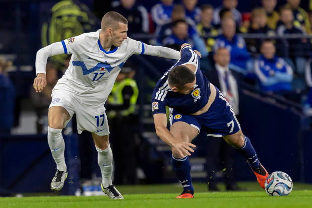 Scotland v Slovenia, UEFA Nations League John McGinn of Scotland national team, Nationalteam keeps the ball while under pressure from David Zec of Slovenia during the UEFA Nations League League B Group B1 between Scotland and Slovenia. Barclays Hampden, Hampden Park, Glasgow, Scotland. 6 October 2026. Hampden Park Barclays Hampden Glasgow Scotland Editorial use only , Copyright: xColinxPoultneyx PSI-24964-0001