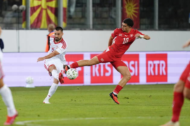 Luzern, Switzerland - October 06: Mohamed Zeki Amdouni (10 SUI) jumps for a kick against Gjoko Zajkov (5 MKD) during the UEFA Nations League match between Switzerland and North Macedonia at thermoplan arena on October 06, 2026 in Luzern, Switzerland. Copyright: xKjetilxWaberx xSPPx Sportspressphoto_SPR247221