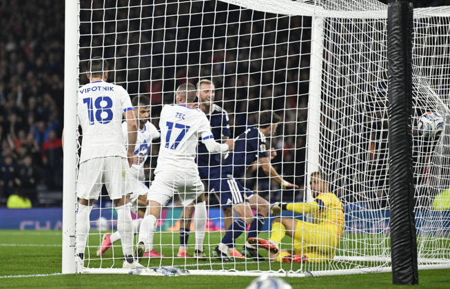 Glasgow, Scotland, 6th October 2026. Ryan Christie of Scotland scores the opening goal during the Scotland vs Slovenia UEFA Nations League match at Hampden Park, Glasgow. Picture credit should read: Neil Hanna Sportimage EDITORIAL USE ONLY. No use with unauthorised audio, video, data, fixture lists, club league logos or live services. Online in-match use limited to 120 images, no video emulation. No use in betting, games or single club league player publications. SPI_019_NH_Scotland_Slovenia SPI-5054-0019