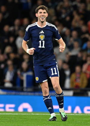 Glasgow, Scotland, 6th October 2026. Ryan Christie of Scotland scores the opening goal during the Scotland vs Slovenia UEFA Nations League match at Hampden Park, Glasgow. Picture credit should read: Neil Hanna Sportimage EDITORIAL USE ONLY. No use with unauthorised audio, video, data, fixture lists, club league logos or live services. Online in-match use limited to 120 images, no video emulation. No use in betting, games or single club league player publications. SPI_022_NH_Scotland_Slovenia SPI-5054-0022