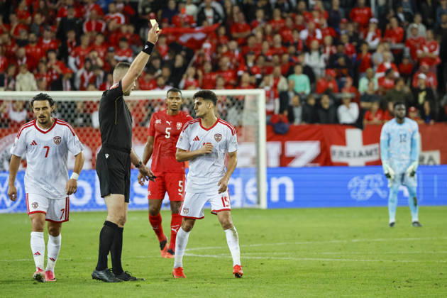 Agon Elezi of North Macedonia, 15, receives a yellow card from referee Edgars Malcevs (LVA), Switzerland, UEFA, Nations League, Matchday 4, Switzerland vs. North Macedonia, October 6, 2026, Swissporarena, Lucerne, Switzerland Copyright: xGrantxHubbsx