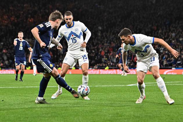 Scotland v Slovenia UEFA Nations League Ben Gannon-Doak of Scotland crosses the ball past Danijel Sturm and Erik Janza of Slovenia during the UEFA Nations League match at Barclays Hampden, Glasgow 06 10 2026 UK Newspapers OUT Copyright: xJamiexJohnstonx FIL-24032-0081
