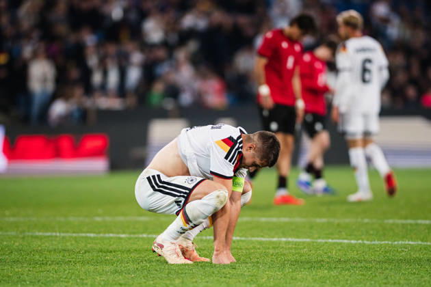 U-21 European Championship Qualifier: Germany vs. Georgia, October 6, 2026. Nicolò Tresoldi (Germany) lies on the ground after the final whistle. Soccer, U-21 European Championship Qualifier, Matchday 10: Germany vs. Georgia on October 6, 2026, Bielefeld DFB REGULATIONS PROHIBIT ANY USE OF PHOTOGRAPHS AS IMAGE SEQUENCES AND OR QUASI-VIDEO Copyright: xBEAUTIFULxSPORTS Tonhäuserx
