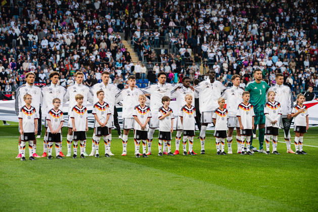 U21 European Championship Qualifier: Germany vs. Georgia, October 6, 2026; Germany during the national anthem: Paris Brunner (Germany), 19; Noah Darvich (Germany), 17; Aljoscha Kemlein (Germany), 16; Dženan Pejcinovic, Germany, 11, Nnamdi Collins, Germany, 20, Noel Aseko, Germany, 8, Joshua Quarshie, Germany, 5, Lukas Ullrich, Germany, 3, Elias Baum, Germany, 2, Mio Backhaus, Germany, 1, Nicolò Tresoldi Germany, 9 Soccer, U-21 European Championship Qualifiers, Matchday 10: Germany vs. Georgia on October 6, 2026, Bielefeld DFB REGULATIONS PROHIBIT ANY USE OF PHOTOGRAPHS AS IMAGE SEQUENCES AND OR QUASI-VIDEO Copyright: xBEAUTIFULxSPORTS Tonhäuserx
