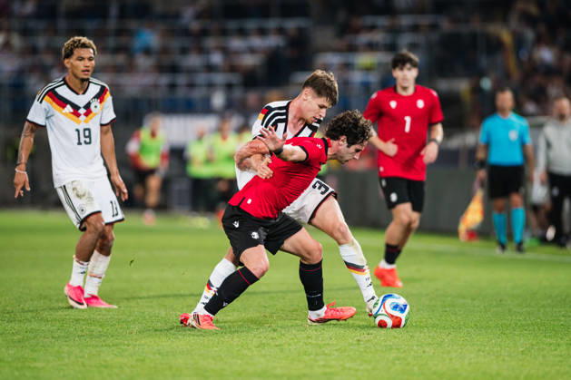 U-21 European Championship Qualifier: Germany vs. Georgia, October 6, 2026; Lukas Ullrich (Germany), 3, vs. Dato Bukia (Georgia), 3; Soccer; U-21 European Championship Qualifier; Matchday 10: Germany vs. Georgia on October 6, 2026; Bielefeld DFB REGULATIONS PROHIBIT ANY USE OF PHOTOGRAPHS AS IMAGE SEQUENCES AND OR QUASI-VIDEO Copyright: xBEAUTIFULxSPORTS Tonhäuserx