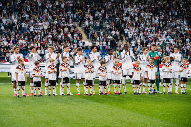 U21 European Championship Qualifier: Germany vs. Georgia, October 6, 2026; Germany during the national anthem: Paris Brunner (Germany), 19; Noah Darvich (Germany), 17; Aljoscha Kemlein (Germany), 16; Dženan Pejcinovic, Germany, 11, Nnamdi Collins, Germany, 20, Noel Aseko, Germany, 8, Joshua Quarshie, Germany, 5, Lukas Ullrich, Germany, 3, Elias Baum, Germany, 2, Mio Backhaus, Germany, 1, Nicolò Tresoldi Germany, 9 Soccer, U-21 European Championship Qualifiers, Matchday 10: Germany vs. Georgia on October 6, 2026, Bielefeld DFB REGULATIONS PROHIBIT ANY USE OF PHOTOGRAPHS AS IMAGE SEQUENCES AND OR QUASI-VIDEO Copyright: xBEAUTIFULxSPORTS Tonhäuserx