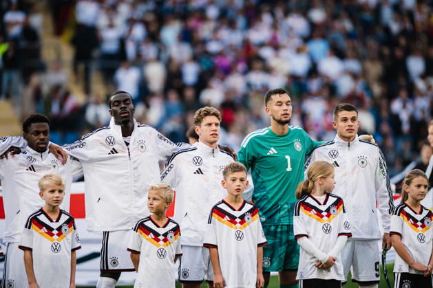 U-21 European Championship Qualifier: Germany vs. Georgia, October 6, 2026: Germany during the national anthem; from left: Noel Aseko (Germany), 8; Joshua Quarshie (Germany), 5; Elias Baum (Germany), 2; Mio Backhaus (Germany), 1; Nicolò Tresoldi (Germany), 9; Soccer; U-21 European Championship Qualifiers, Matchday 10: Germany vs. Georgia on October 6, 2026, Bielefeld. DFB regulations prohibit any use of photographs as image sequences and or quasi-video. Copyright: xBEAUTIFULxSPORTS Tonhäuserx