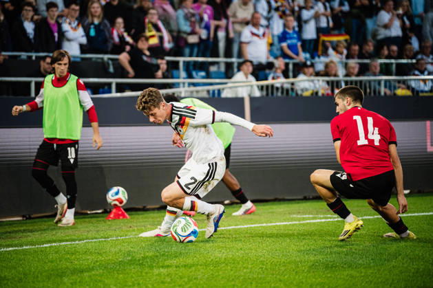 U-21 European Championship Qualifier: Germany vs. Georgia, October 6, 2026; Elias Baum (Germany, 2) vs. Aleko Basiladze (Georgia, 14); Soccer; U-21 European Championship Qualifier; Matchday 10: Germany vs. Georgia on October 6, 2026; Bielefeld DFB REGULATIONS PROHIBIT ANY USE OF PHOTOGRAPHS AS IMAGE SEQUENCES AND OR QUASI-VIDEO Copyright: xBEAUTIFULxSPORTS Tonhäuserx