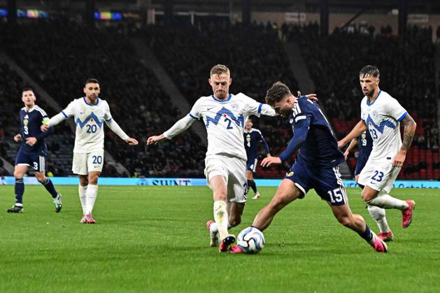 Scotland v Slovenia UEFA Nations League Josh McPake of Scotland looks to get past Zan Karnicnik of Slovenia™s tackle during the UEFA Nations League match at Barclays Hampden, Glasgow 06 10 2026 UK Newspapers OUT Copyright: xJamiexJohnstonx FIL-24032-0130