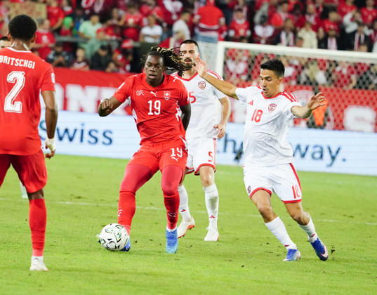 October 6, 2026, Lucerne, Switzerland, Thermoplan Arena, Men s Soccer, 2026–2027 Season, Nations League, Switzerland vs. North Macedonia, 3–0, Photo: Winsley Boteli (19, SUI) vs. Tihomir Kostadinov (NMK), Action: Tackle