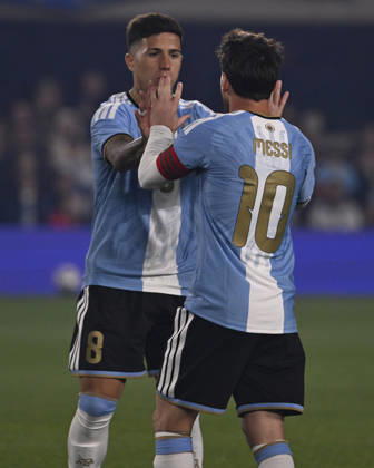 BUENOS AIRES, ARGENTINA - OCTOBER 06 : Forward Lionel Messi 10 of Argentina high-fives teammate Enzo Fernandez 8 during an International Friendly, Länderspiel, Nationalmannschaft match against Benin at Estadio Monumental on October 06, 2026 in Buenos Aires, Argentina. This historic match marks the final international appearance who wore a commemorative special-edition kit replacing the traditional manufacturer branding with his personal signature logo. Photo by SFSI Argentina national team, Nationalteam v Benin Copyright: xSFSIx