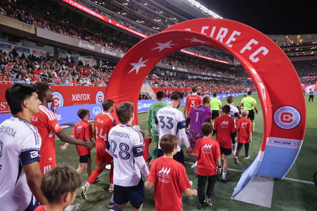 CHICAGO, USA - October 6: Chicago Fire FC and Vancouver Whitecaps FC players walk onto the pitch before the Major League Soccer game between Chicago Fire FC and Vancouver Whitecaps FC at Soldier Field on Tuesday October 6 in Chicago, USA Copyright: xShainaxBenhiyoun SPPx Sportspressphoto_SPR247795