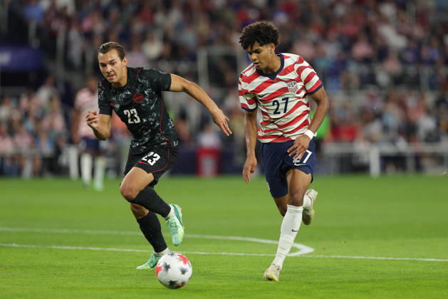 SAINT PAUL, MN - OCTOBER 06: United States Mathis Albert (27) and Canada™s Niko Sigur (23) run for the ball during the first half of the men™s friendly match between the U.S. national team, Nationalteam and Canada™s national team on October 6th, 2026, at Allianz Field in Saint Paul, MN. (Photo by Bailey Hillesheim Icon Sportswire) SOCCER: OCT 06 USA vs Canada EDITORIAL USE ONLY Icon20261006009