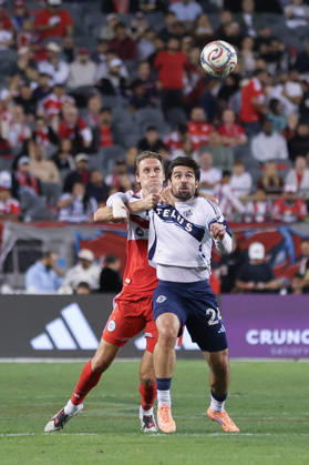CHICAGO, USA - October 6: Jack Elliott (3 Chicago Fire FC) grabs onto Brian White (24 Vancouver Whitecaps FC) during the Major League Soccer game between Chicago Fire FC and Vancouver Whitecaps FC at Soldier Field on Tuesday October 6 in Chicago, USA Copyright: xShainaxBenhiyoun SPPx Sportspressphoto_SPR247858