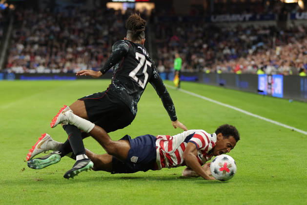 SAINT PAUL, MN - OCTOBER 06: Canada™s Nathan Saliba (25) fouls United States Tyler Adams (4) during the second half of the men™s friendly match between the U.S. national team, Nationalteam and Canada™s national team on October 6th, 2026, at Allianz Field in Saint Paul, MN. (Photo by Bailey Hillesheim Icon Sportswire) SOCCER: OCT 06 USA vs Canada EDITORIAL USE ONLY Icon20261006022