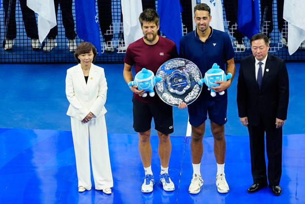 October 6, 2026, Beijing, China: Runners-up Sander Arends and David Pel of Netherlands pose with the trophy during the medal ceremony after the Men s Doubles final match against Julian Cash and Lloyd Glasspool of Great Britain (not in view) on day seven of China Open at the National Tennis Center. Julian Cash and Lloyd Glasspool won, Final Score: 6-3, 3-6, 10-6 Beijing China - ZUMAs197 20261006_aaa_s197_270 Copyright: xPolyxFeix